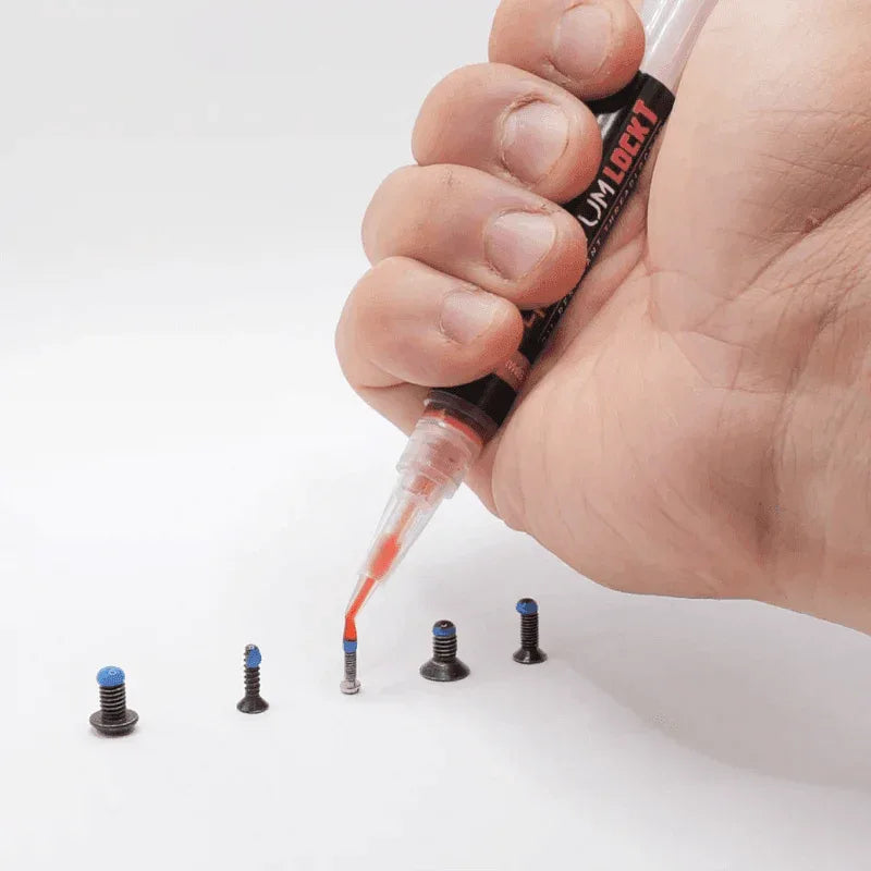 4UANTUM LOCK THREAD LOCKER applied to screws for secure fastening in various applications