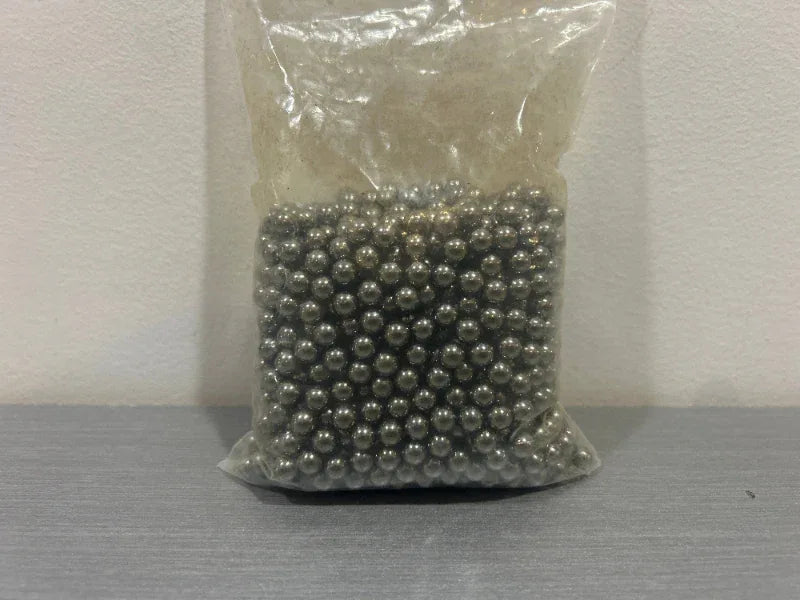 Packet of 6mm steel BBs intended for airsoft guns with high precision and durability