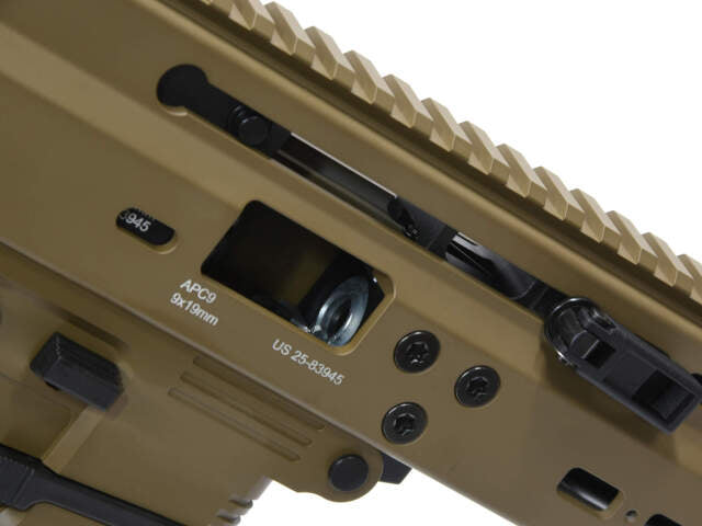 Close-up of ARCHWICK B&T airsoft gbbr showcasing detailed internals and rail system