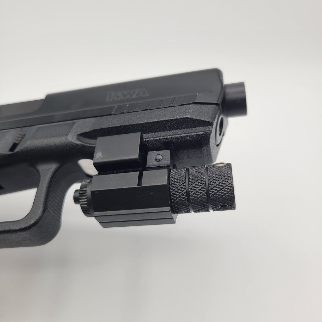 KWA airsoft pistol with tactical rail and flashlight attachment for enhanced gameplay