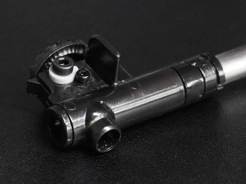 Airtech conversion asg internal metal component with adjustment gears on black surface
