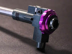 Close-up of AIRTECH PROMETHEUS internal component with purple adjustment dial on dark surface