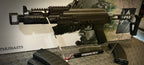 ARCTURUS AK74U CUSTOM airsoft rifle displayed with accessories on a clear stand