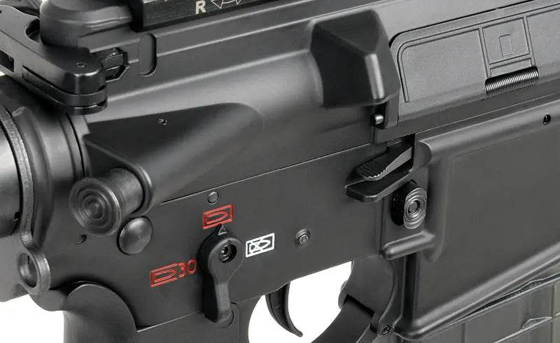 Close-up view of ARCTURUS GR16 AEG AIRSOFT gun trigger and safety selector details in black