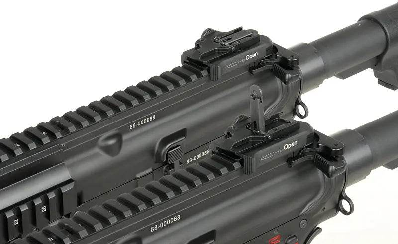 Close-up of ARCTURUS GR16 AEG AIRSOFT rifles showing black upper receivers and rail systems