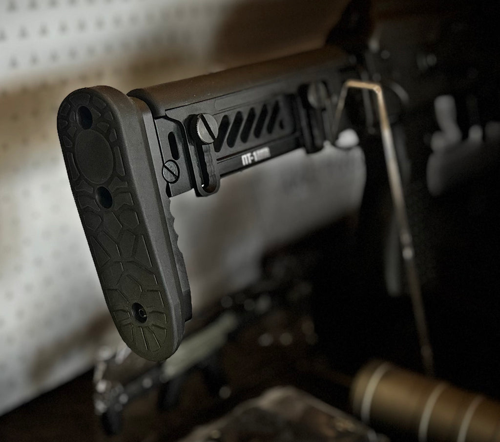 Close-up of ARCTURUS PP19 sp1 AEG stock with textured grip for enhanced stability and control