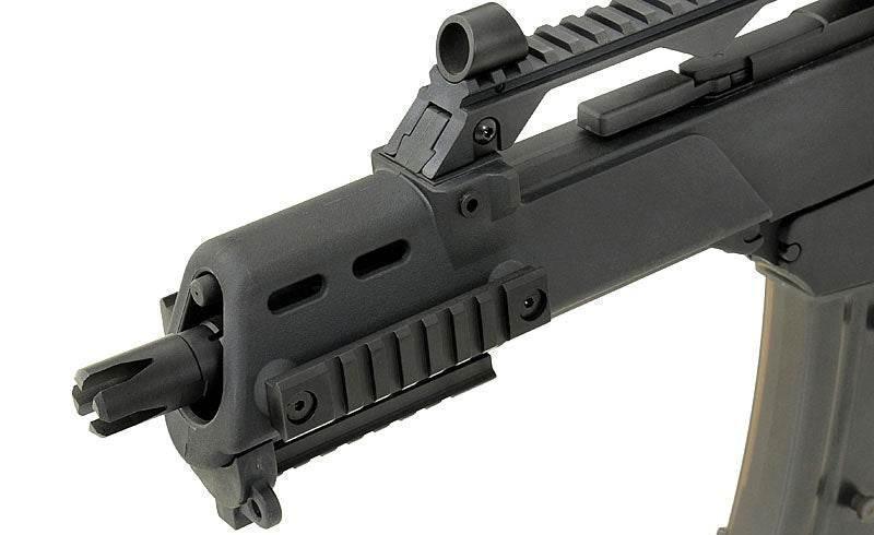 Close-up of ARMY ARMAMENT GBB R36C AIRSOFT rifle featuring tactical rail and muzzle design