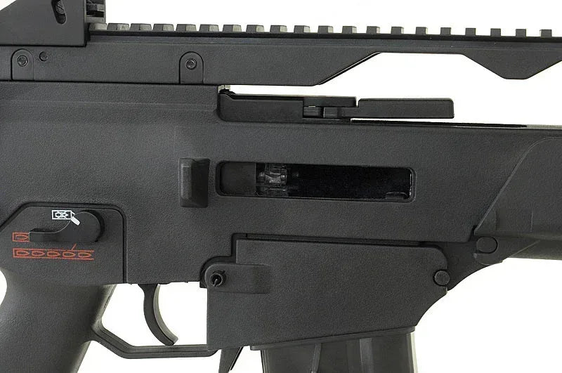 Close-up of ARMY ARMAMENT GBB R36C AIRSOFT featuring detailed receiver and controls