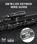 AM M-LOK KeyMod wire guide with flashlight mounted on a tactical rail system