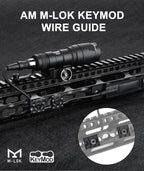 AM M-LOK KeyMod wire guide with flashlight mounted on a tactical rail system