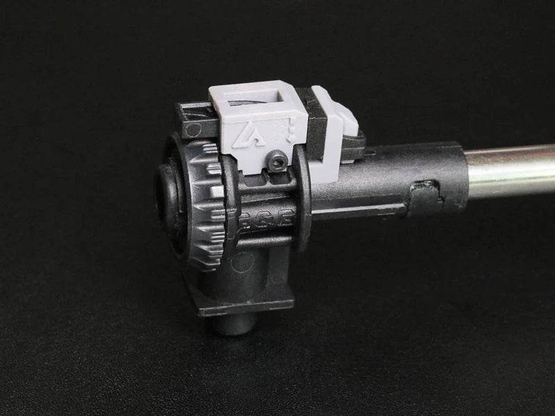 AIRTECH conversion kit airtech component with black and gray plastic parts and metal rod on black background