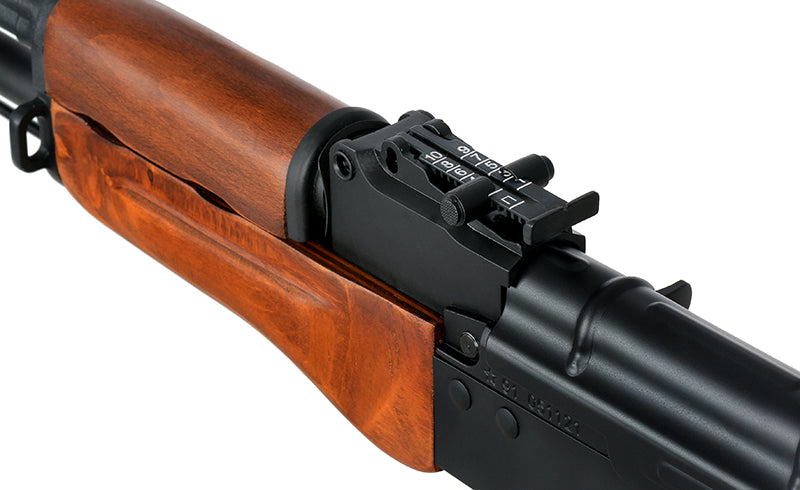 Double Bell AKM airsoft rifle AEG close up of wood handguard rear sight and black metal receiver