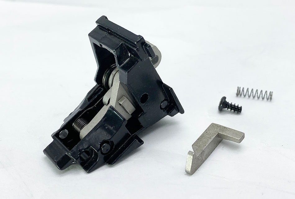 E&C hammer housing for G18 airsoft with spring, screw, and small metallic part included