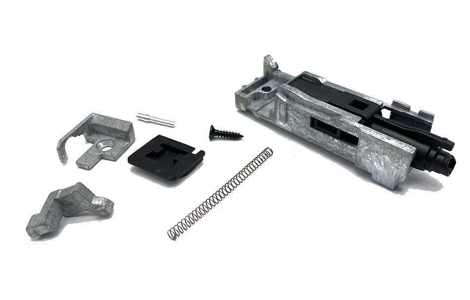 E&C G18 nozzle housing assembly and replacement parts laid out on white background for repair