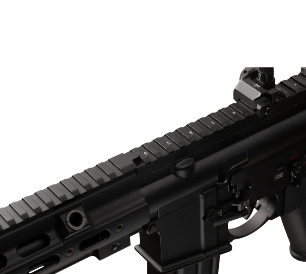 Close-up of the E&C HK416 A5 airsoft gun featuring a detailed rail system and sight mount