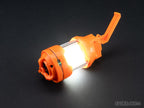 T238 GRENADE bright orange tactical grenade with built-in LED light on black background
