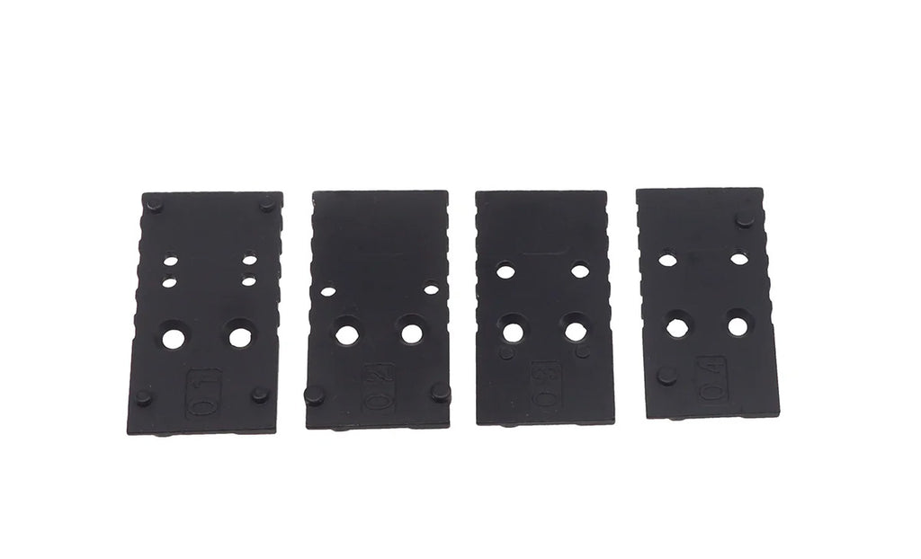 Set of four G17 airsoft magazine base plates in black for enhanced grip and performance