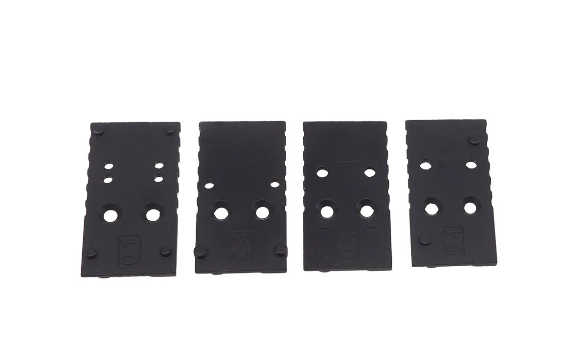 Set of four G17 airsoft magazine base plates in black for enhanced grip and performance
