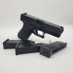 E&C G19 airsoft pistol with three magazines, designed for realistic shooting experiences.