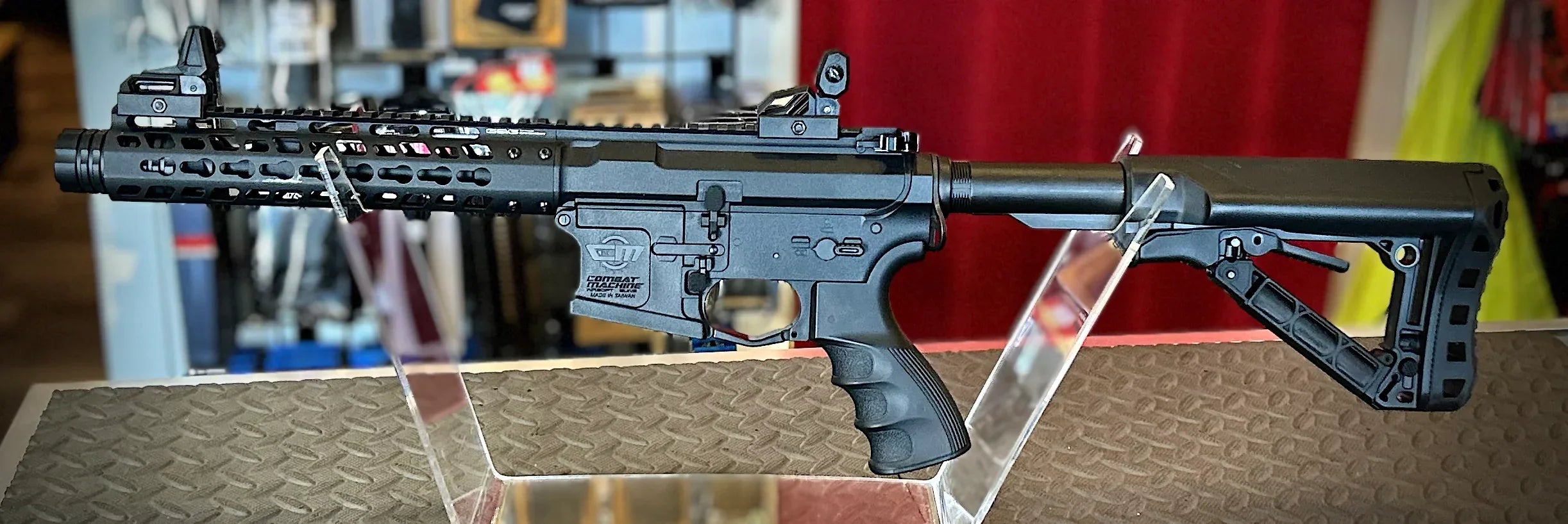 G&G CM16 WILD HOG 9 AEG AIRSOFT on display with sleek black finish and adjustable stock