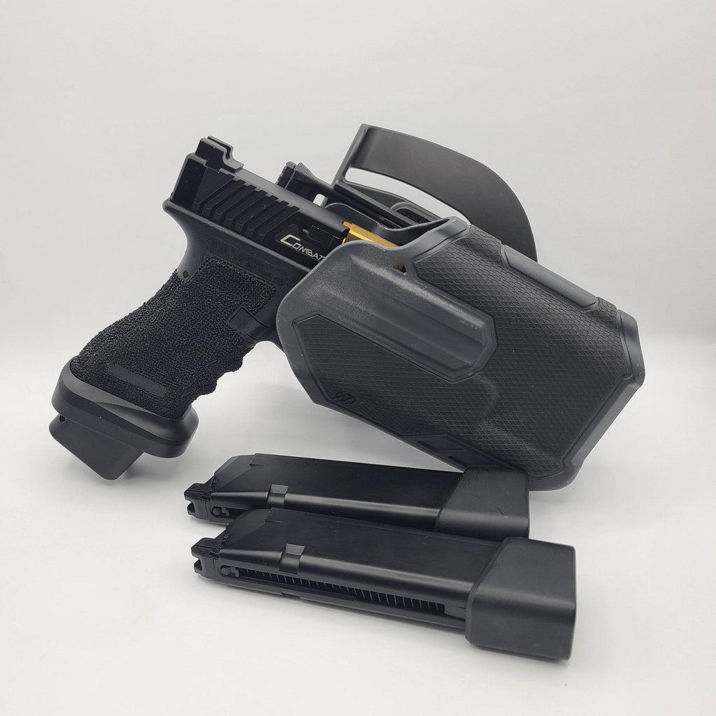 Army Armament Glock A34 airsoft pistol with holster and extra magazine for enhanced gameplay