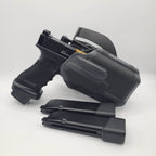 Army Armament Glock A34 airsoft pistol with holster and extra magazine for enhanced gameplay