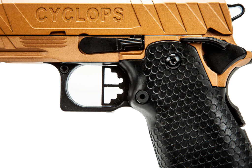 ECHO1 HI CAPA AIRSOFT pistol close-up showing textured black grip and tan slide with Cyclops engraving