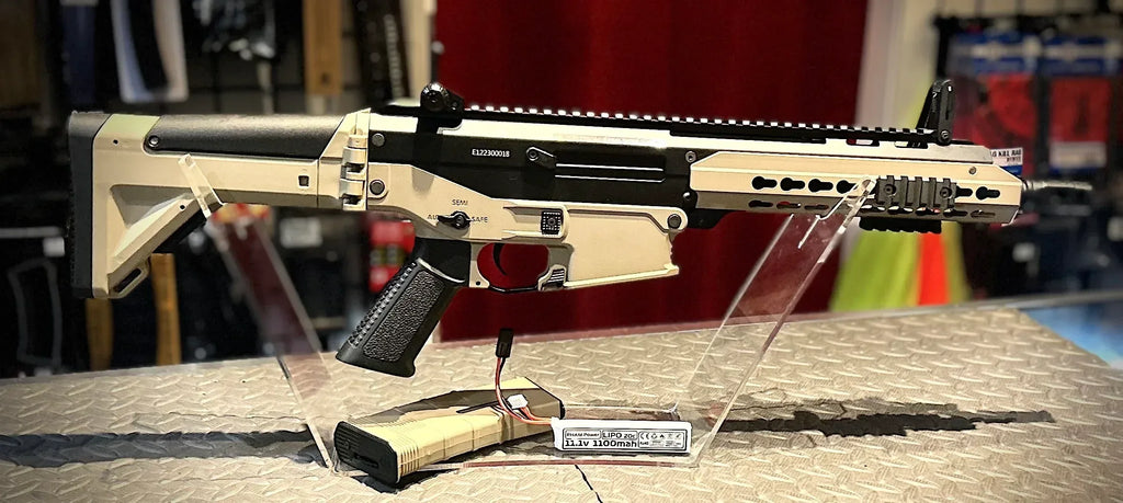 ICS CXP APE TWO TONE AIRSOFT Gun Displayed on a Clear Stand with Tactical Features