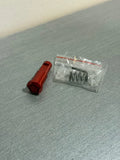 IPSC RED ASSIST BUTTON in red with accompanying spring for quick access features