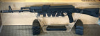KWA AK 74M Airsoft Gun on Display with Transparent Stand and Magazine Rest