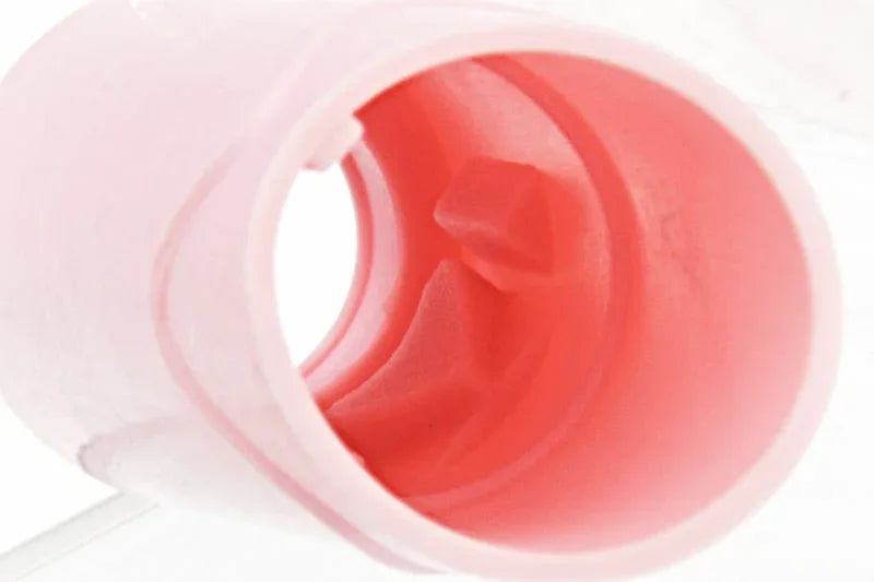 Close-up of MAPLE LEAF SUPER MACARON AEG BUCKING in pink, showcasing its internal design and structure