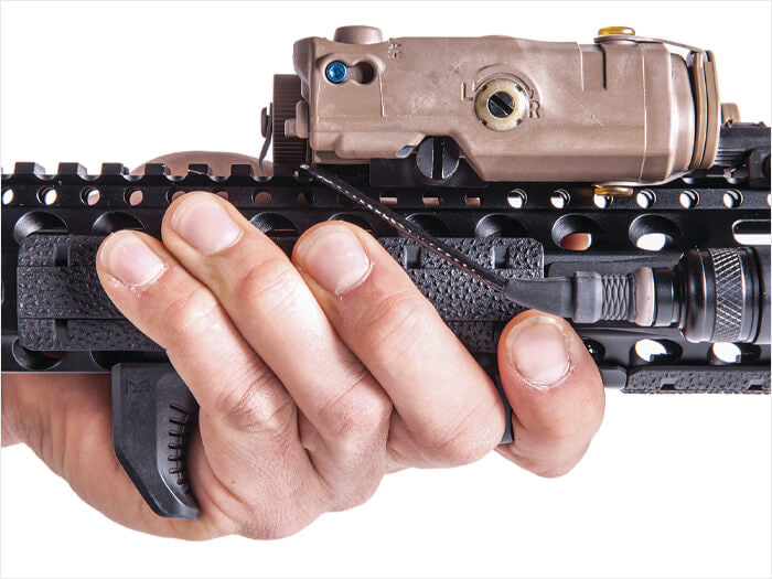 Hand holding a rifle equipped with DOUBLE BELL MP AIRSOFT GRIP accessory for stable handling