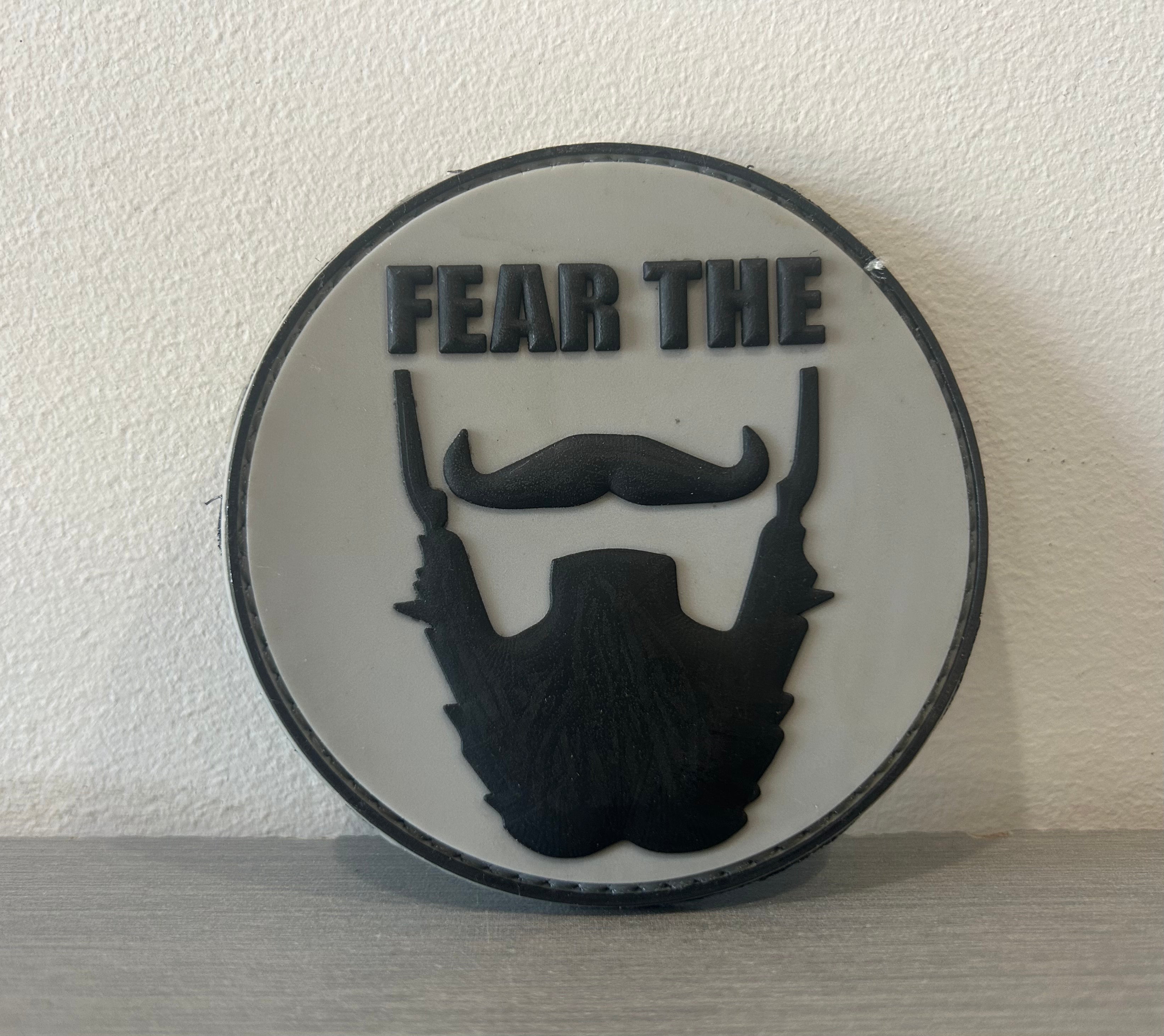 PVC round patch featuring a bearded figure and the words PATCH PVC FEAR THE BEARD