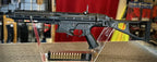 G&G PCC445 airsoft gun displayed with magazine in a retail setting for airsoft enthusiasts