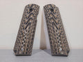 District Airsoft pistol grip cover set featuring textured design for enhanced grip and performance