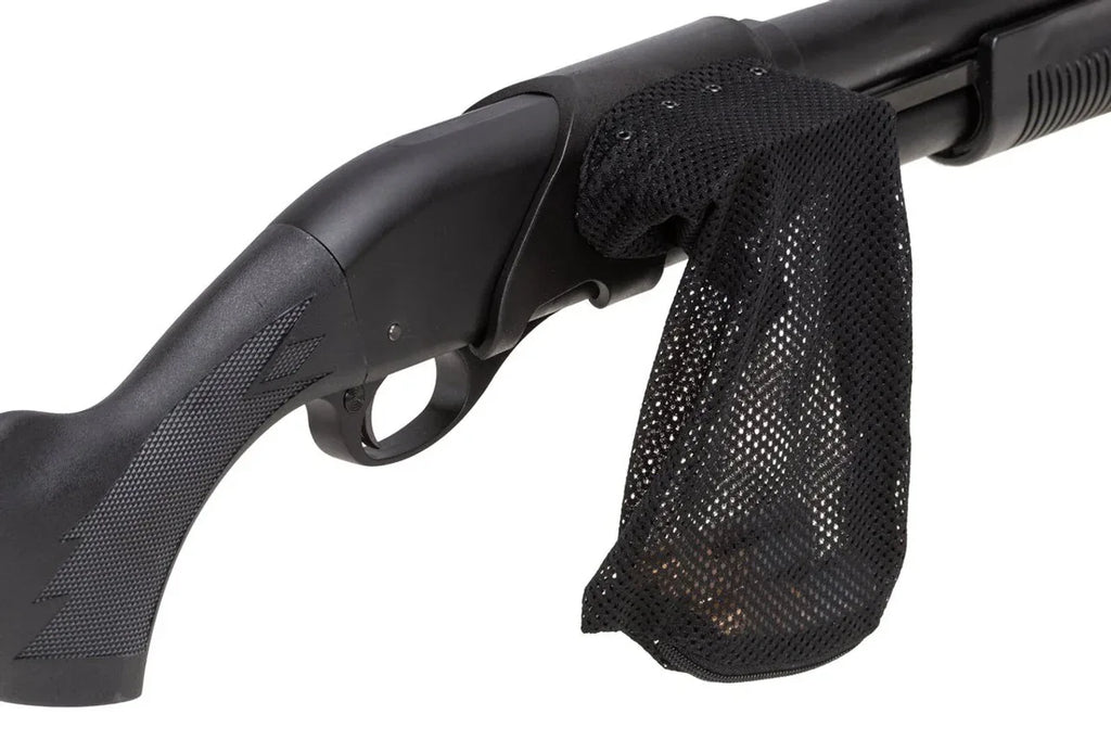 PPS M870 shell catcher mounted on a shotgun to catch spent shell casings during shooting