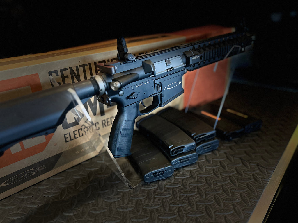 KWA AEG PTS Centurion rifle displayed with magazines and a stylish box for enthusiasts