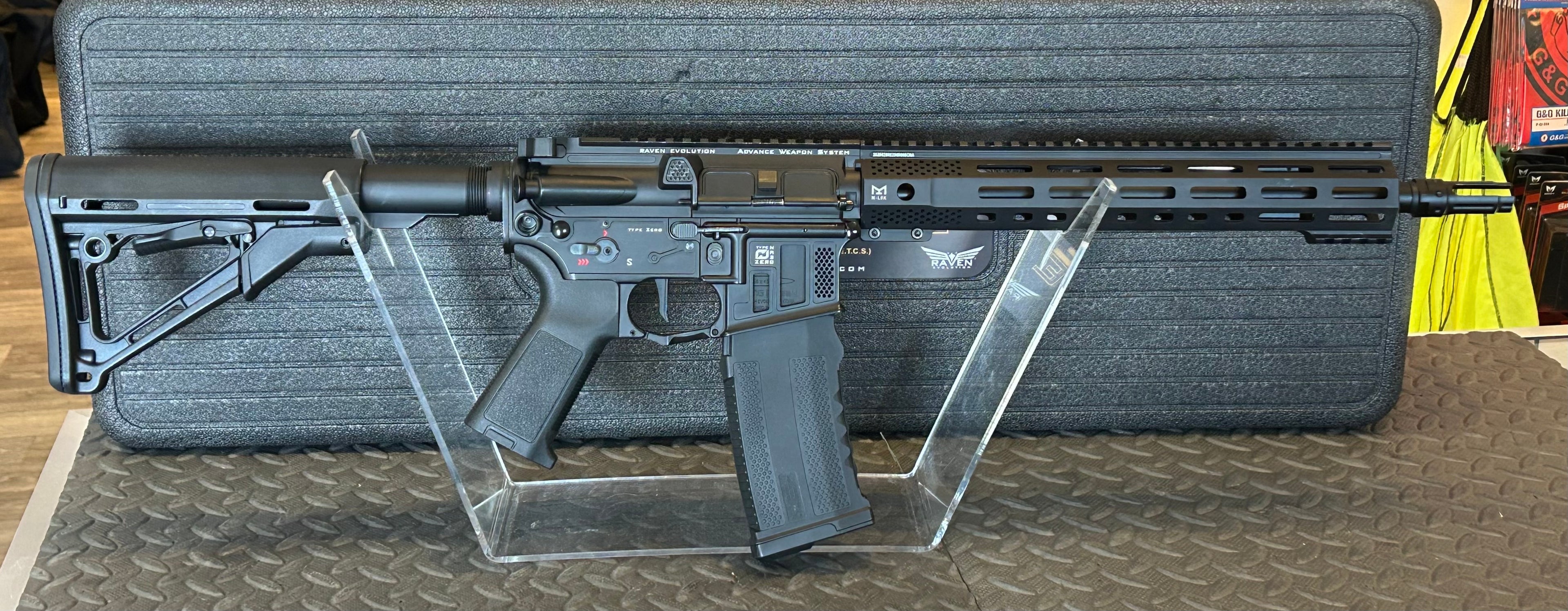 RAVEN ELITE TYPE ZERO CARBINE GEN 2 displayed on a stand, featuring sleek design and tactical rail system