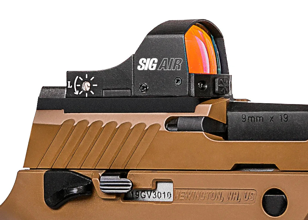 SIG AIR REFLEX SIGHT mounted on a handgun with a sleek design for enhanced targeting accuracy