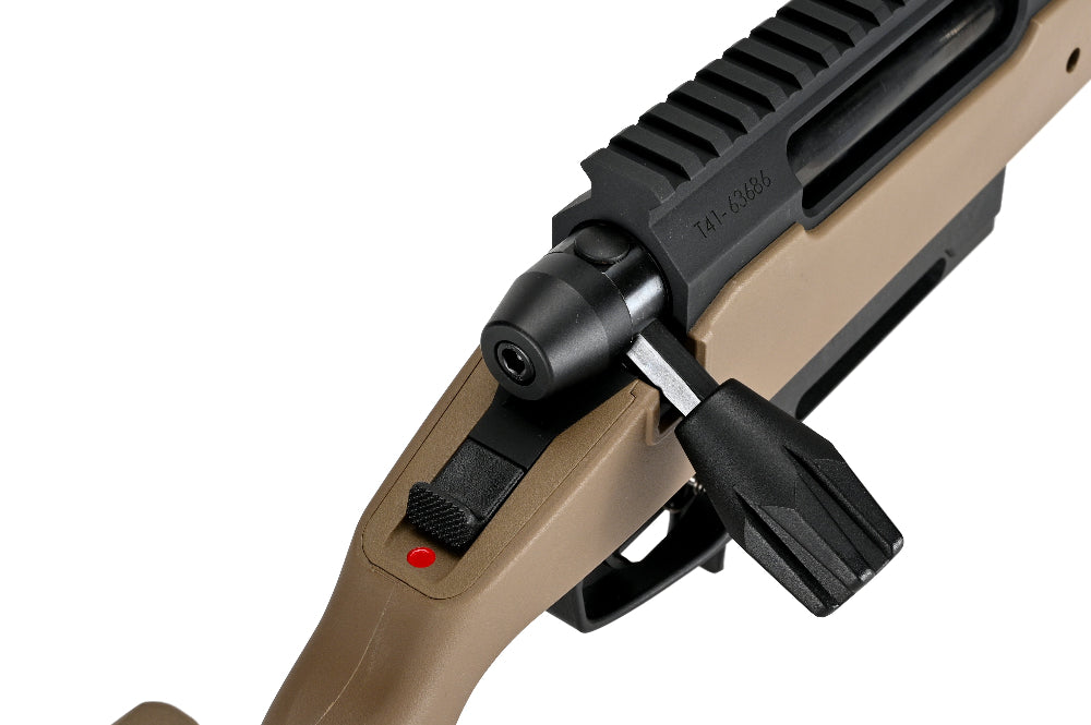 Close up of SILVERBACK TAC-41P sniper rifle bolt and tan chassis showing Picatinny rail detail