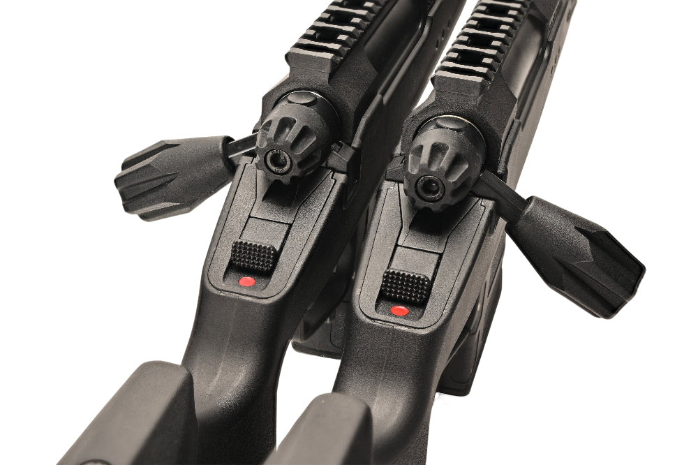 Close up of two SILVERBACK TAC-41P SPORT sniper rifle rear receivers and cocking handles showing safety selectors