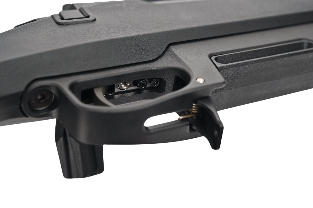 Close up of SILVERBACK TAC-41P SPORT sniper chassis showing trigger, magazine well and polymer stock