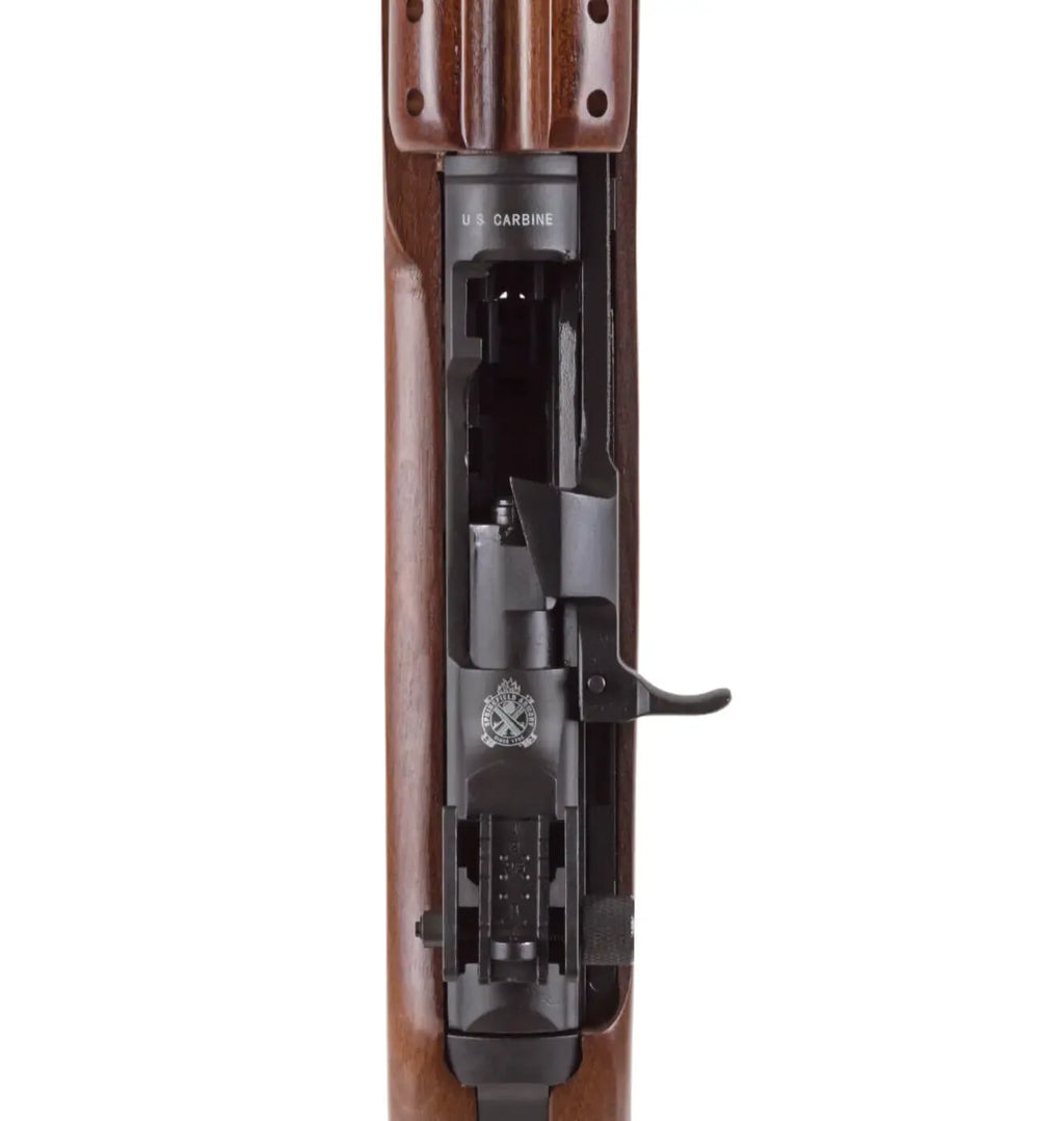 Close-up view of SPRINGFIELD ARMORY M1 CARBINE showing detailed components and trigger area
