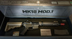 DISTRICT AIRSOFT tokyo marui mk18 gas blowback rifle in hard case with tan stock red muzzle cap and magazine