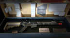 tokyo marui mk18 gas blowback rifle GBBR in foam lined case with tan stock magazine and red muzzle cap
