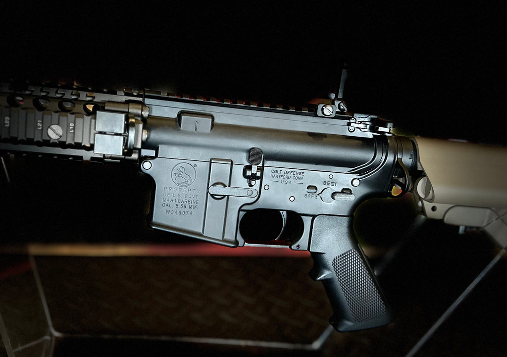 tokyo marui mk18 GBBR close up of metal lower receiver and textured grip by DISTRICT AIRSOFT for skirmishes