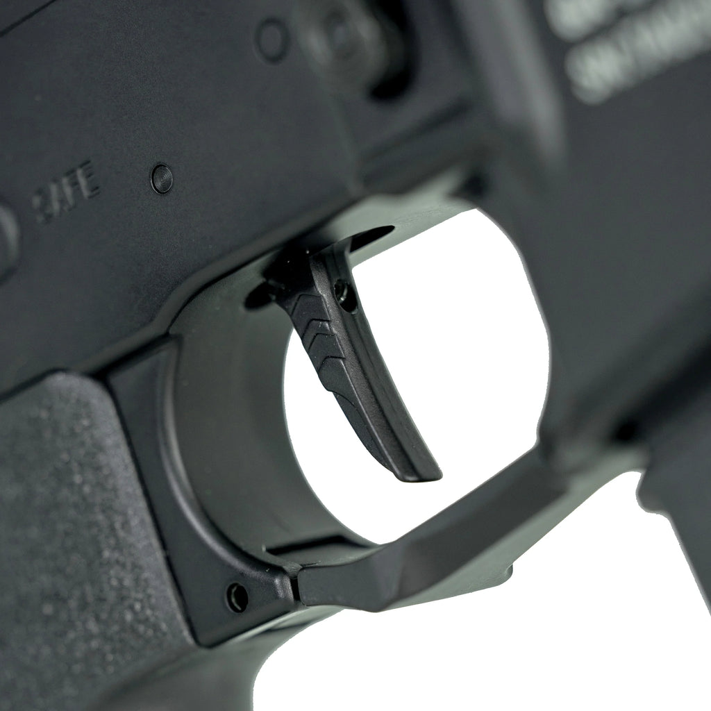 Close-up of AEG trigger mechanism from TRINITY ARMAMENT showcasing precision engineering