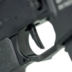 Close-up of TRINITY ARMAMENT HPA trigger mechanism highlighting precision design and functionality