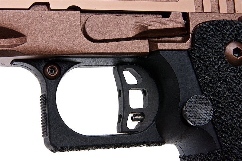 Close-up of ARMY ARMAMENT tti sand viper pistol trigger and grip details