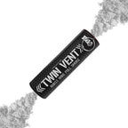 Enola Gaye Twin Vent burst smoke grenade releasing gray smoke from both ends